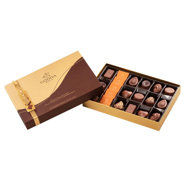 Ciocolată Godiva Connoisseur combinată cu fructul pasiunii, mousse de vanilie, caramel și alte umpluturi delicioase 