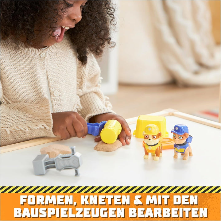 Rubble & Crew - Set de figurine de acțiune cu figurină Rubble & Mix, 2 jucării de construcție și 85G nisip cinetic de construcție, jucărie potrivită pentru copii de la 3 ani în sus