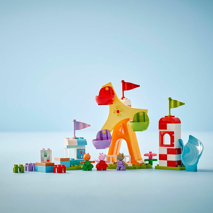 LEGO DUPLO Peppa Wutz Fairground - Jucării pentru copii și jucării pentru abilități motorii pentru vârsta de 2+ - Jocuri preșcolare cu roată mare, tobogan și 3 figuri, inclusiv Mollie Kitty și Klausi Kläff - Cadou pentru copii 10453