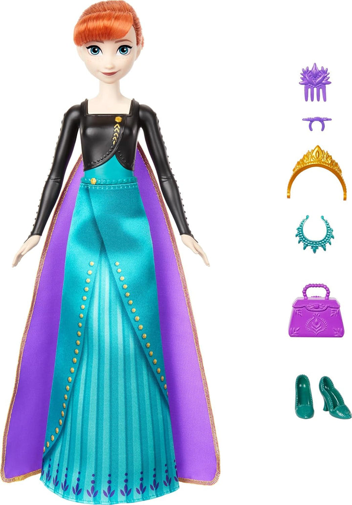 Mattel Disney The Ice Queen Anna Fashion Doll Set, Spin & Reveal cu 11 surprize, inclusiv 5 accesorii, 5 autocolante și o scenă pentru joacă, inspirat de filmul Disney, HXD27